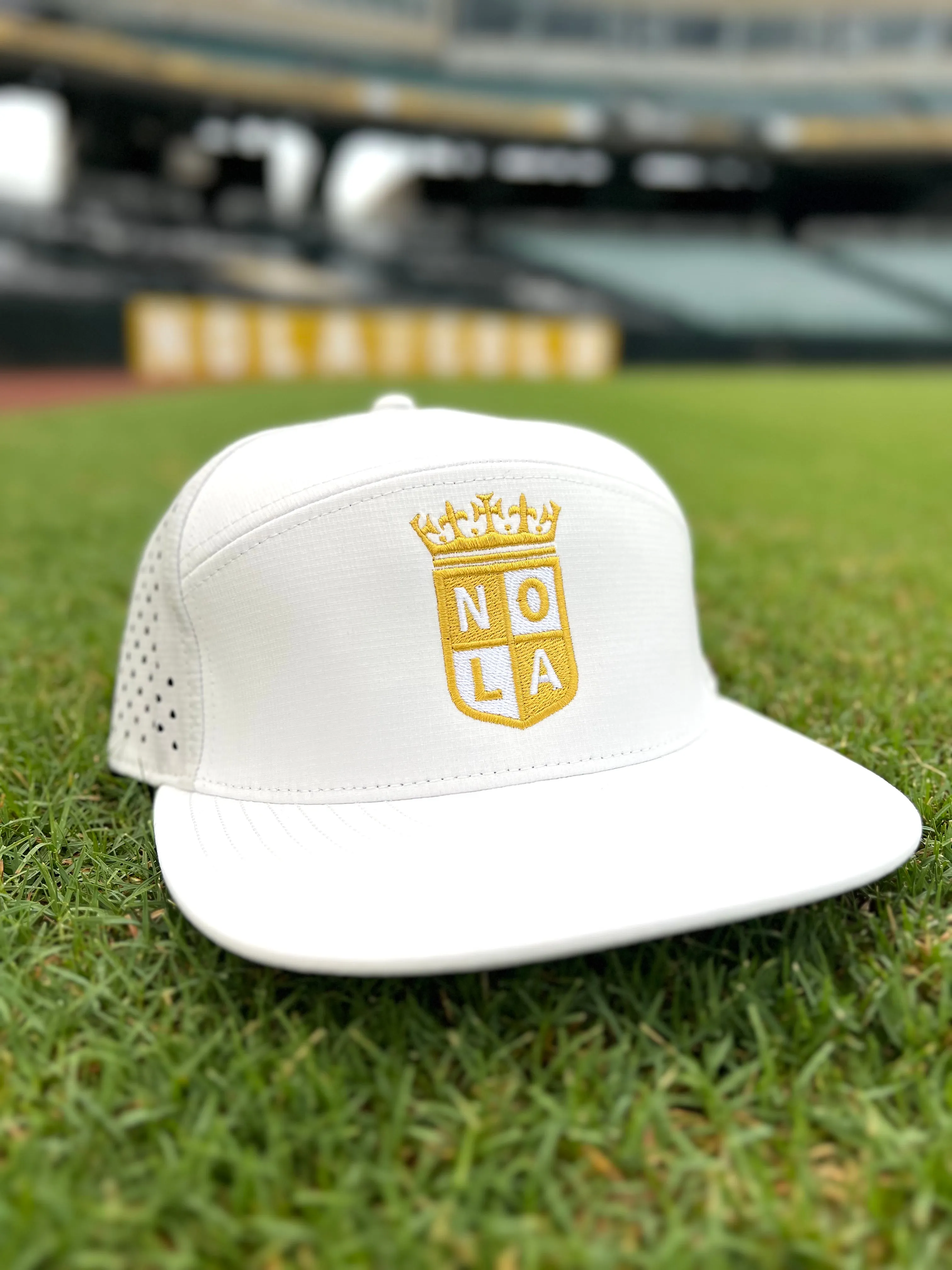 NOLA Gold White Performance Snapback Golf Hat